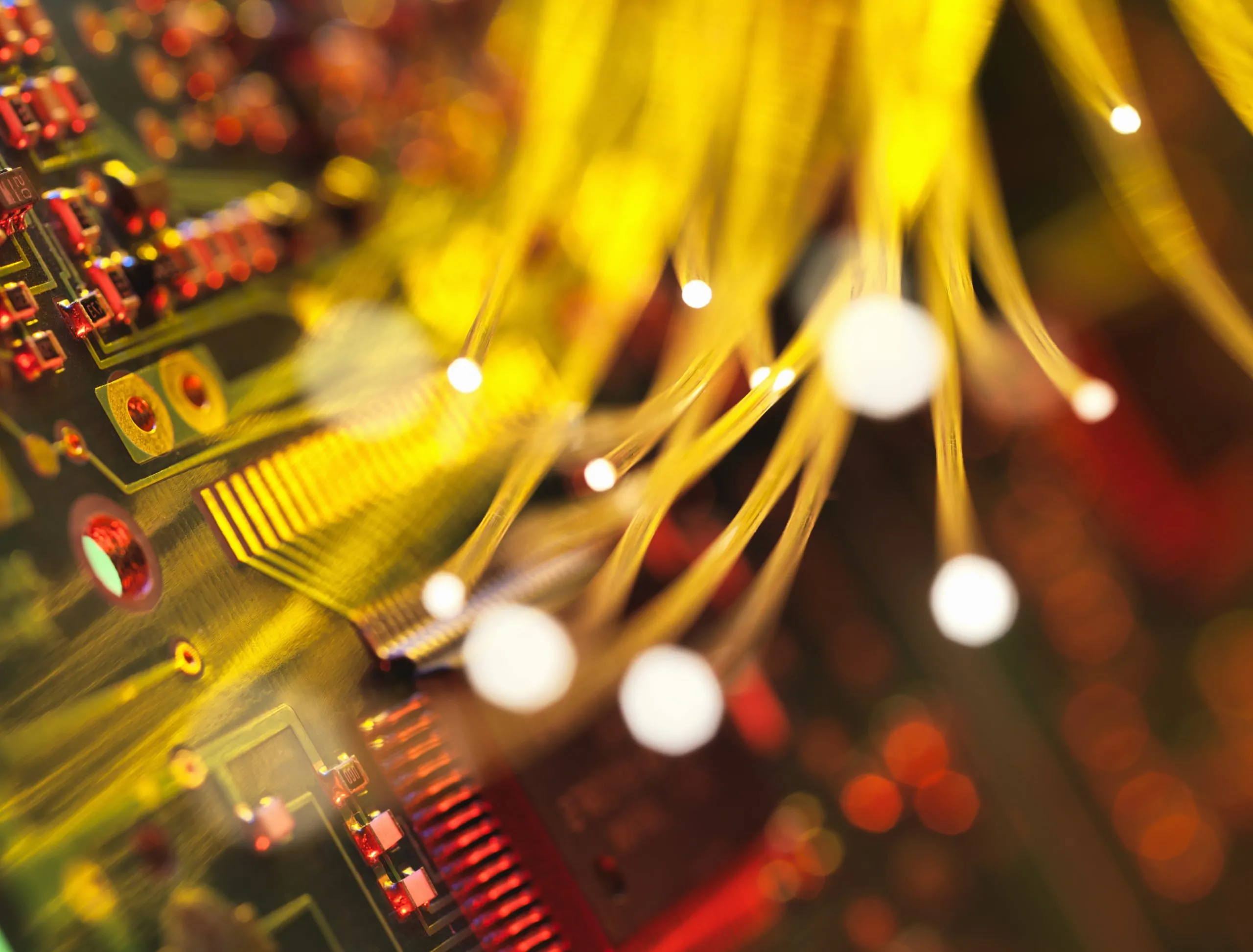Fibre optics carrying data passing a circuit board