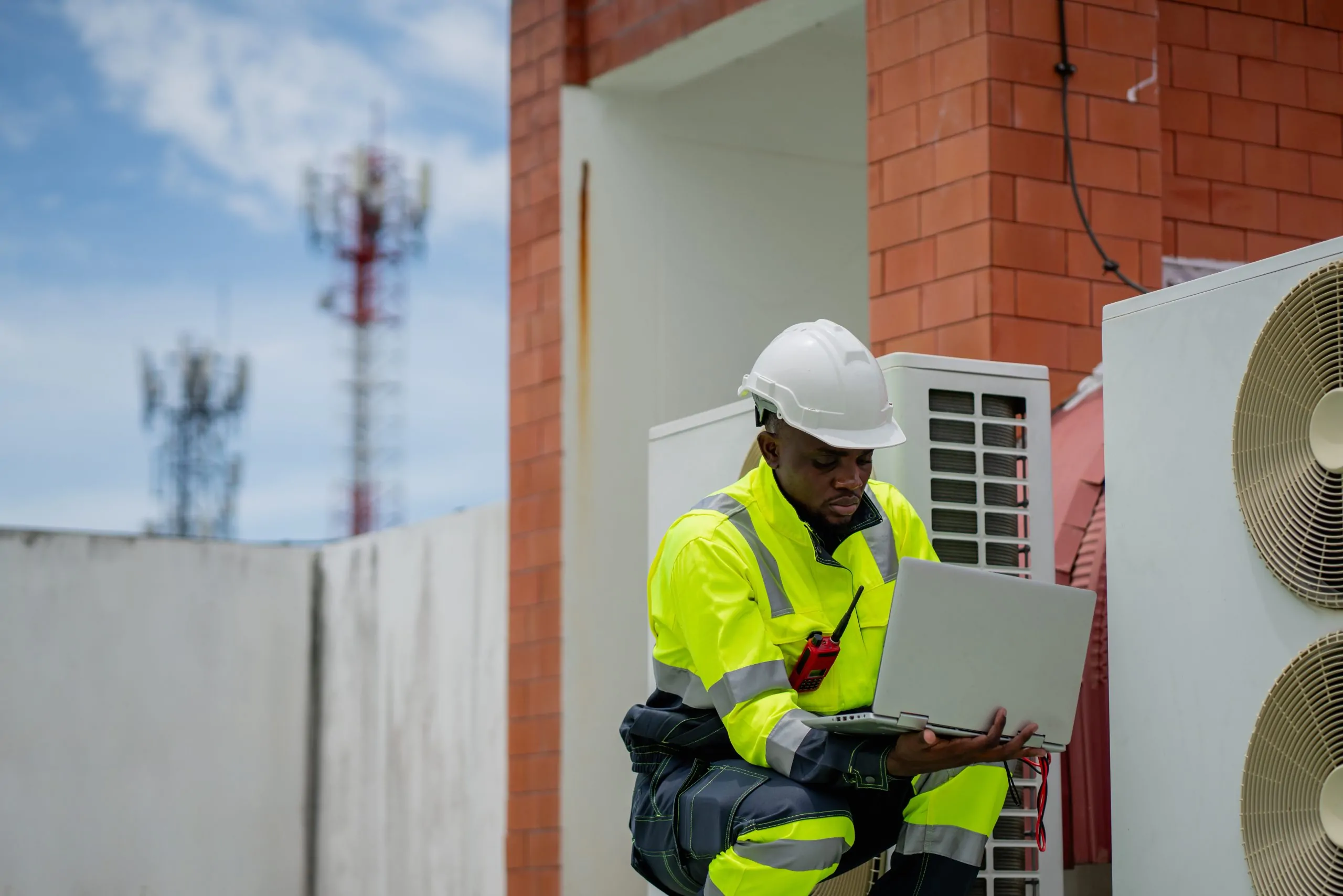 Engineers inspect the cooling system of a large building or industrial facility